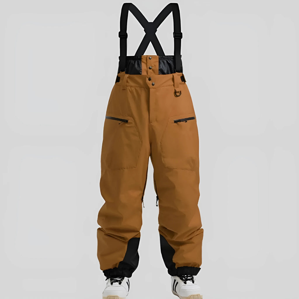 Men's black waterproof ski trousers with adjustable ankle straps on a model