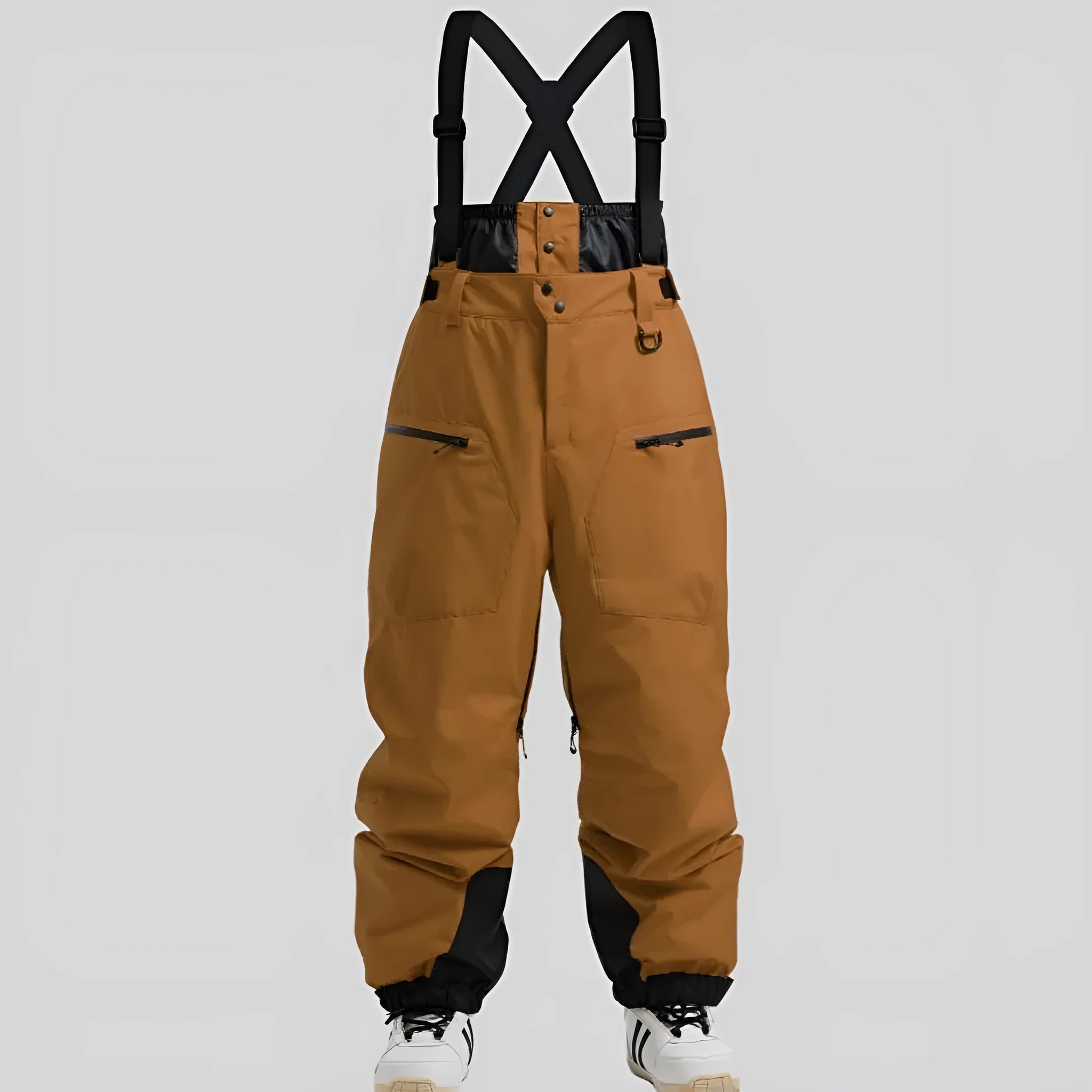 Men's black waterproof ski trousers with adjustable ankle straps on a model