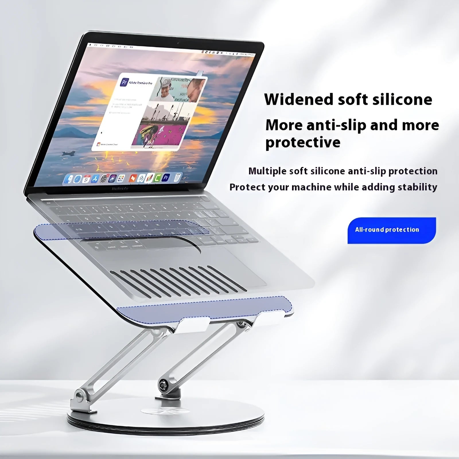 Silver aluminium laptop stand showing rotatable design and height adjustment mechanism