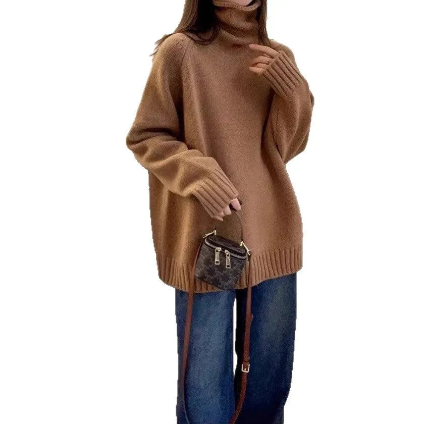 Women's thick loose turtleneck sweater in black with curling pile collar and 3D pattern