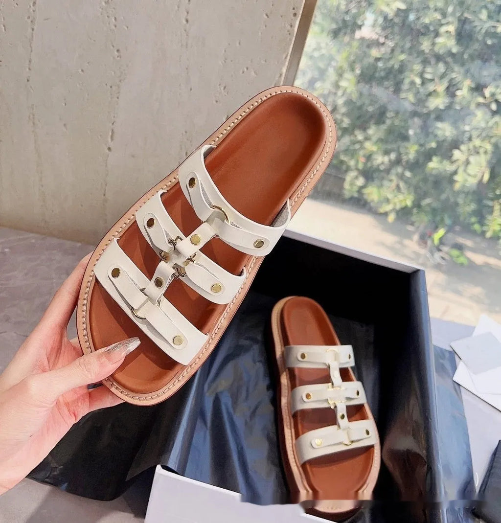 Women's Roman sandal slippers in genuine sheepskin leather available in black, brown, and white colours