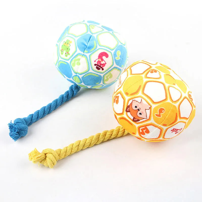 Blue and yellow elastic football dog toy with cartoon design for tug of war and teeth grinding