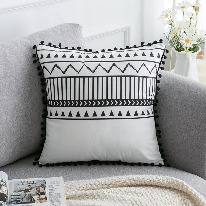 Bohemian style throw pillow on a sofa, available in light grey, black, or white, shown in 45x45cm size.