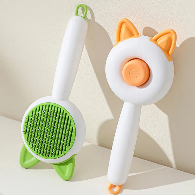 Self-cleaning pet grooming brush with stainless steel bristles and TPR massage tips in greenish white colour