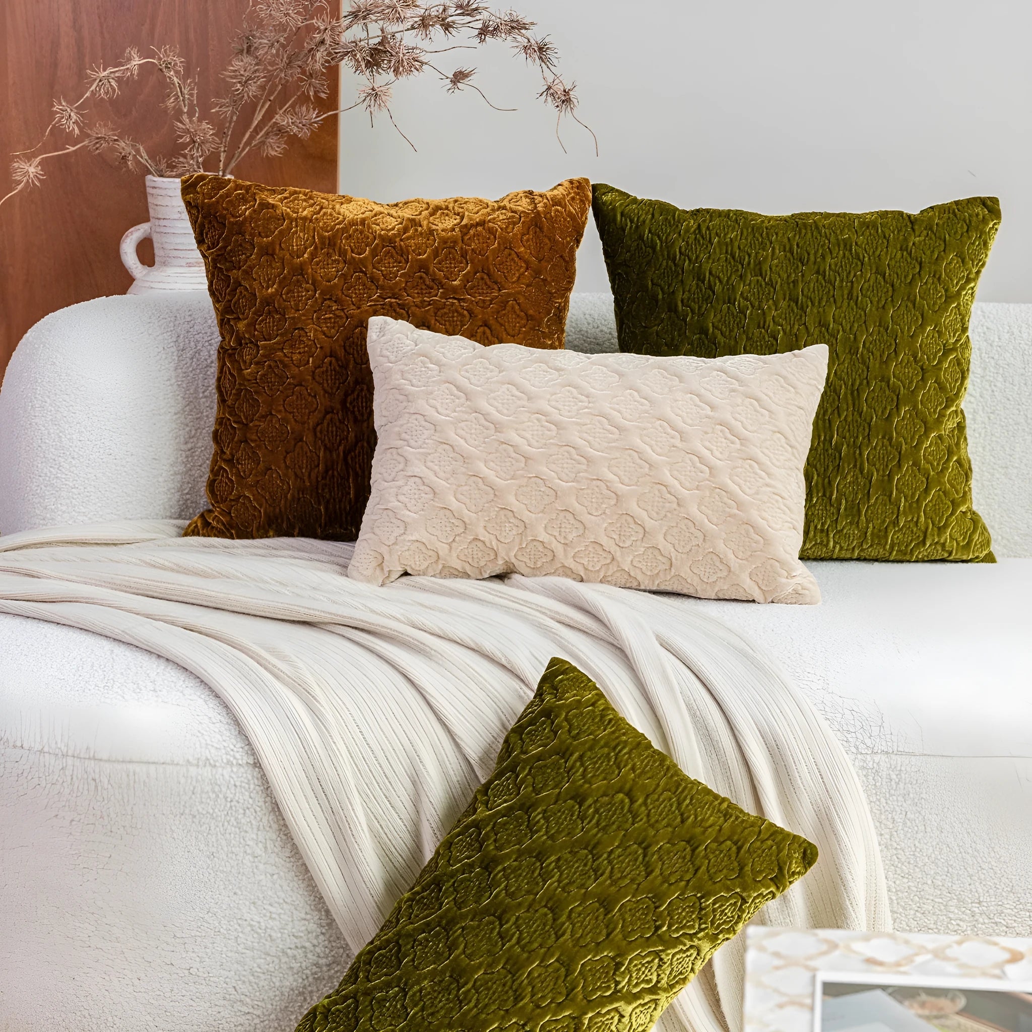 Brown gold antique Chinese style quilted cushion pillow on a sofa