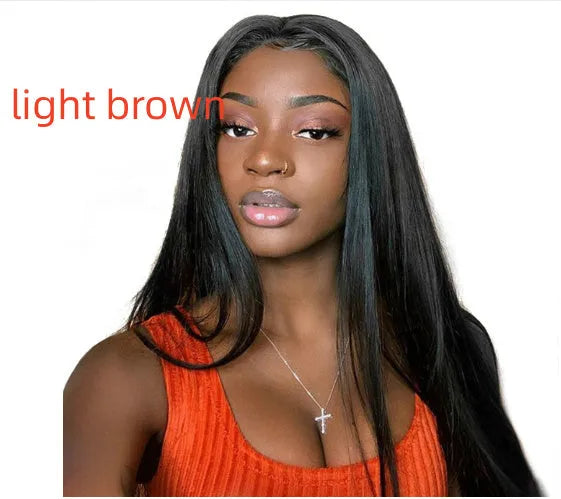 Long straight black synthetic wig with centre part and bangs on a model