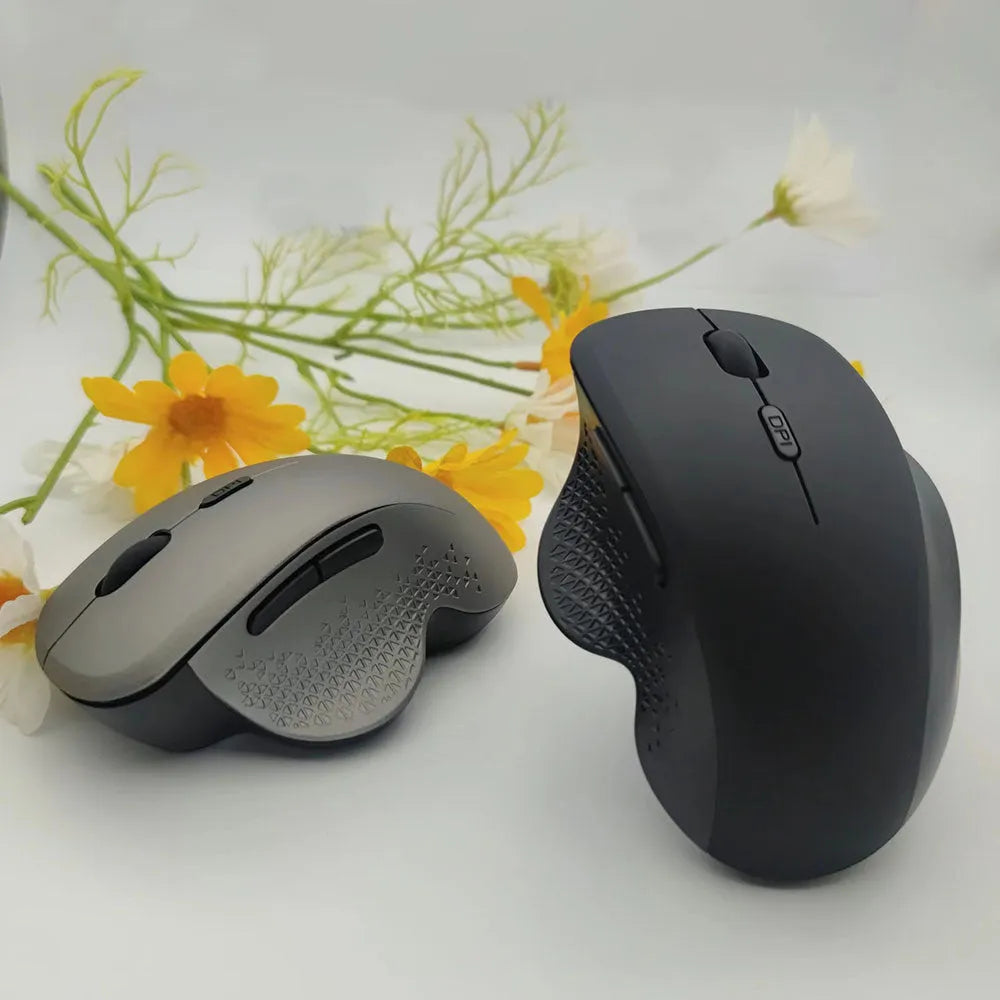 Self-charging wireless laptop mouse in black or grey with USB charging cable