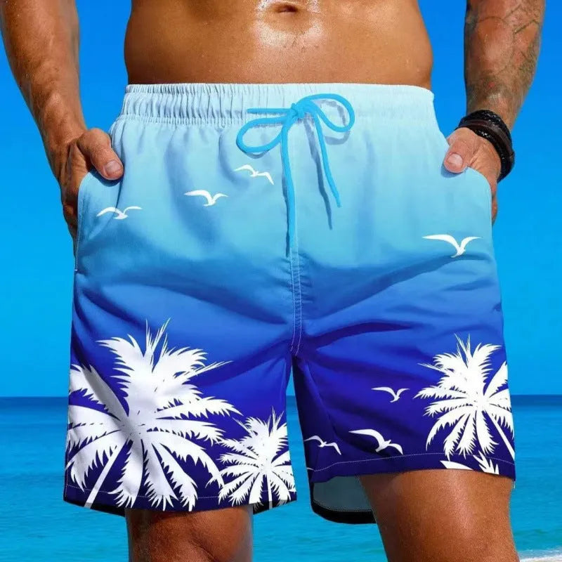 Men's loose board swimming trunks in an ethnic style, made from blue polyester fabric, shown on a size chart.