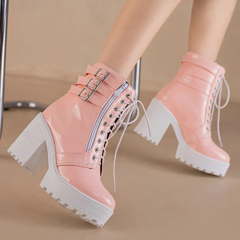 Women's black lace-up platform ankle boots with a round toe and a thick rubber sole.