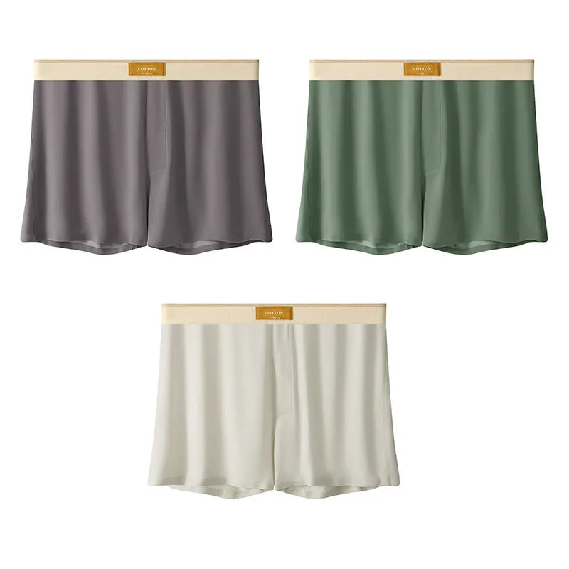 Men's solid colour loose ice silk underwear in a pack of three, shown in beige, black, and grey.