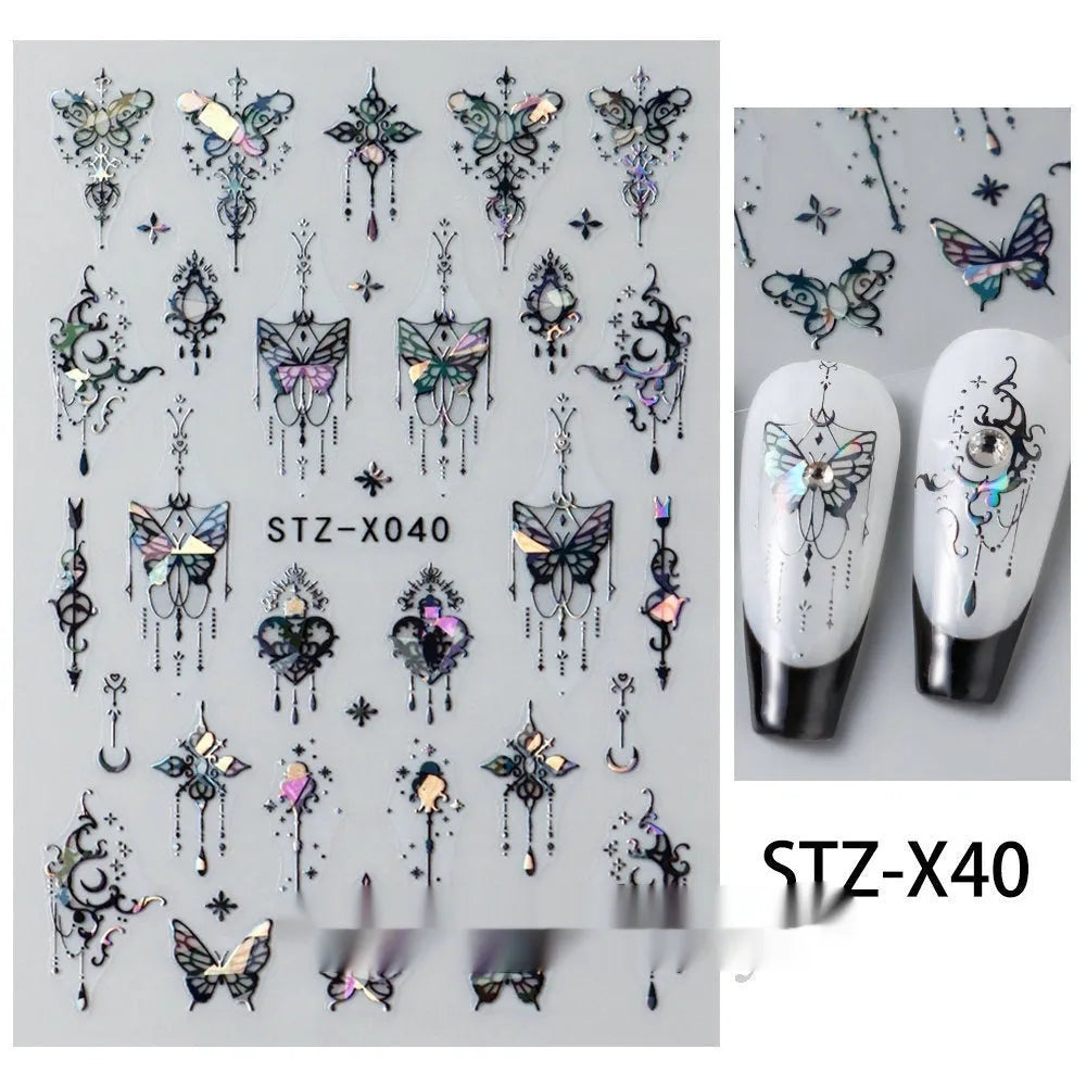Pack of black and silver strip nail art stickers with cartoon and love pattern designs.
