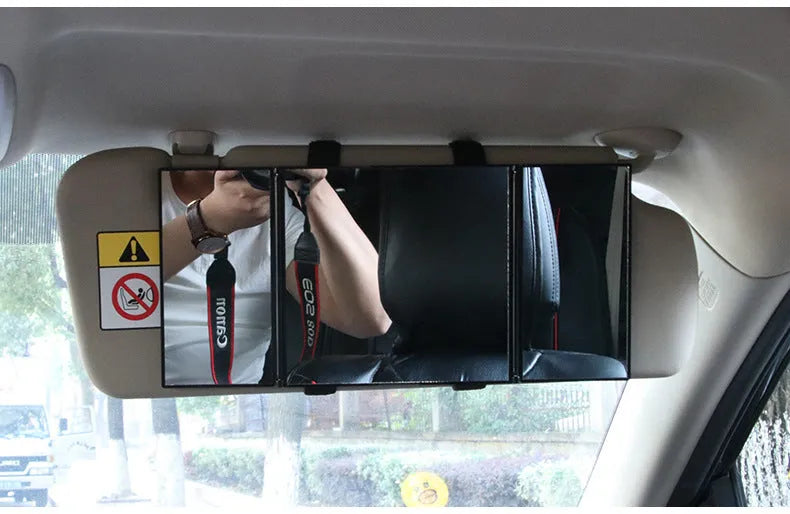 Silver car folding makeup mirror shown closed at 15.5x14cm and opened at 30.5x14cm.