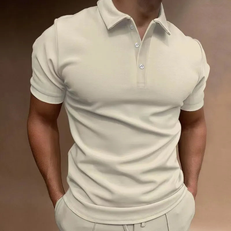 Men's grey cotton blend button t-shirt with short sleeves and a loose fit on a hanger.
