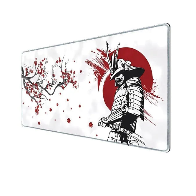 Japanese Samurai design gaming mouse pad on a desk, showing cloth surface and non-slip base.