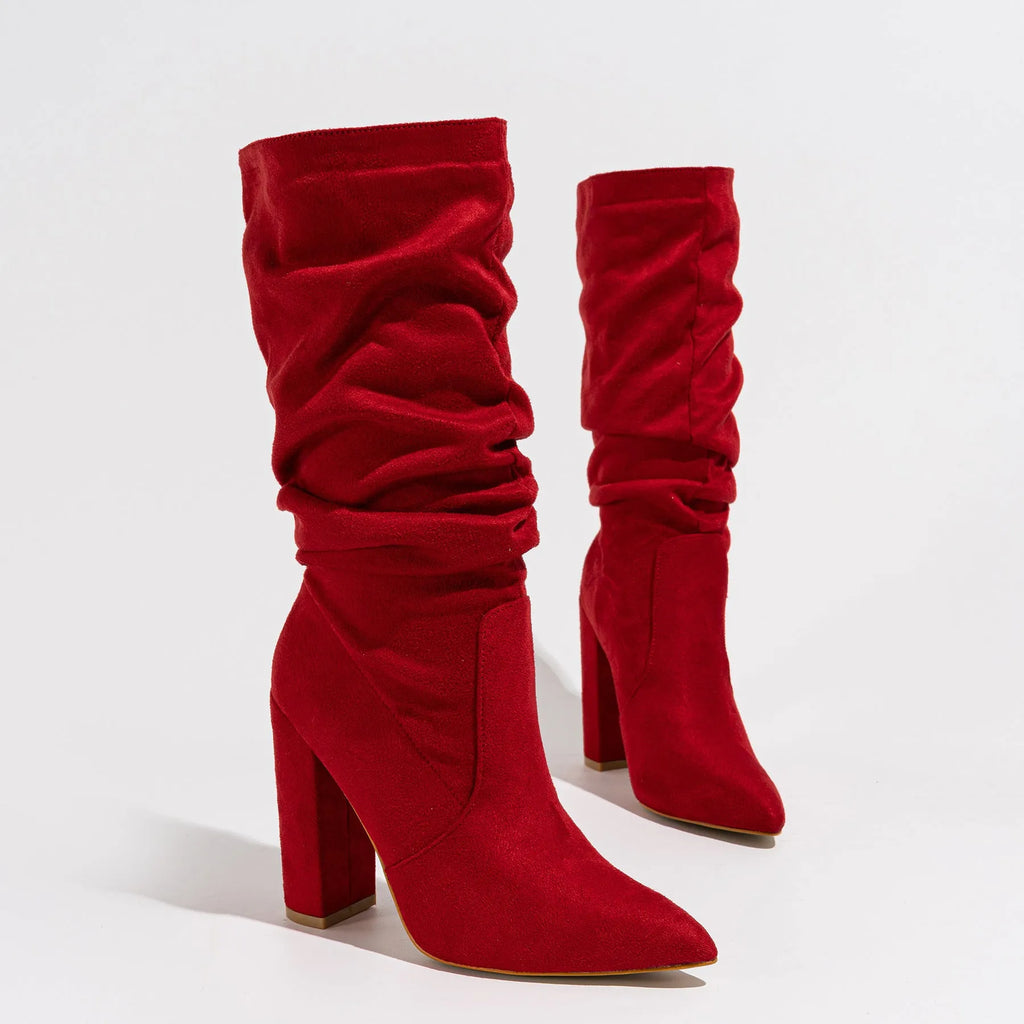 Women's black chunky heel pointed-toe suede boots with mid-calf length and oversleeve design