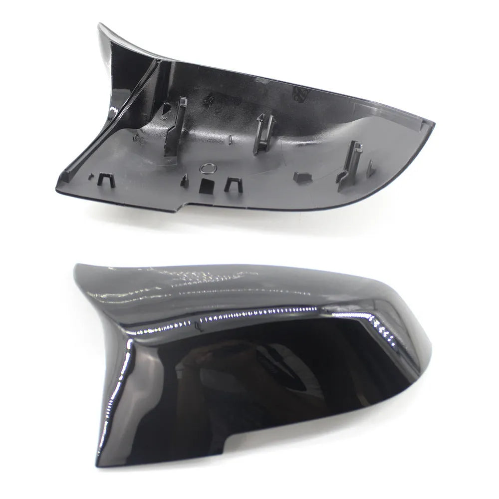 Paint bright black replacement rear-view mirror shell for BMW 3 Series and 4 Series F-model vehicles.