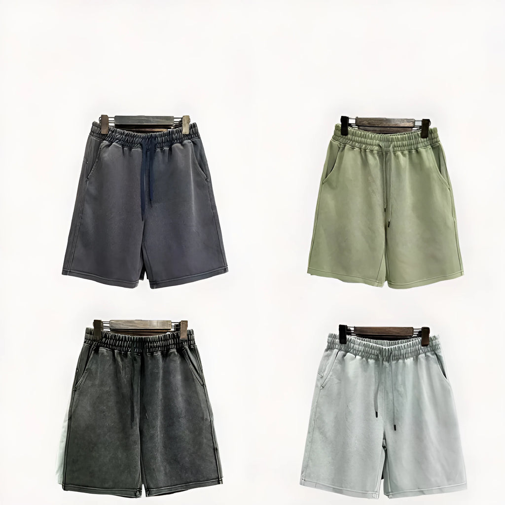 Men's distressed cotton casual shorts in loose straight fit showing fifth length measurement
