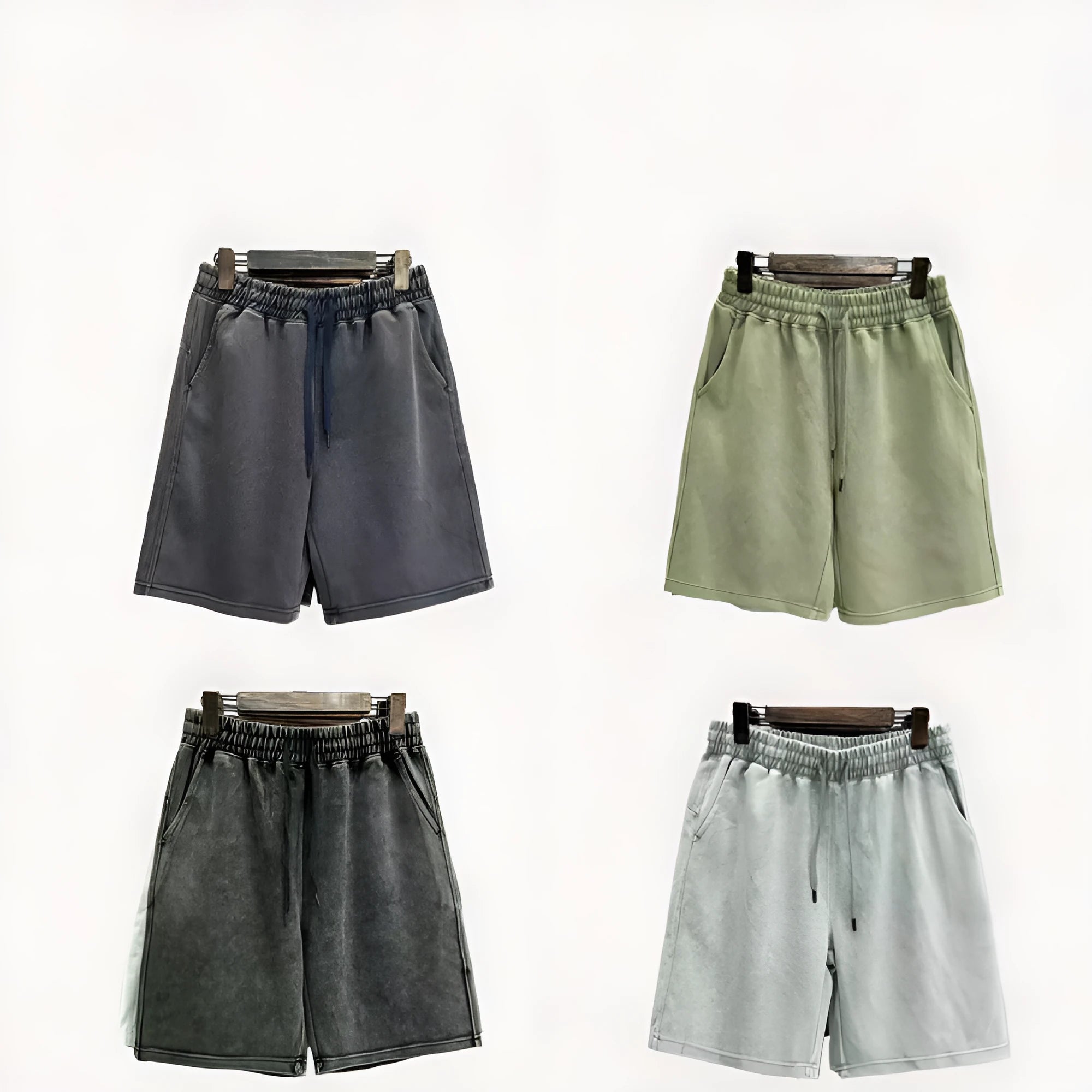 Men's distressed cotton casual shorts in loose straight fit showing fifth length measurement