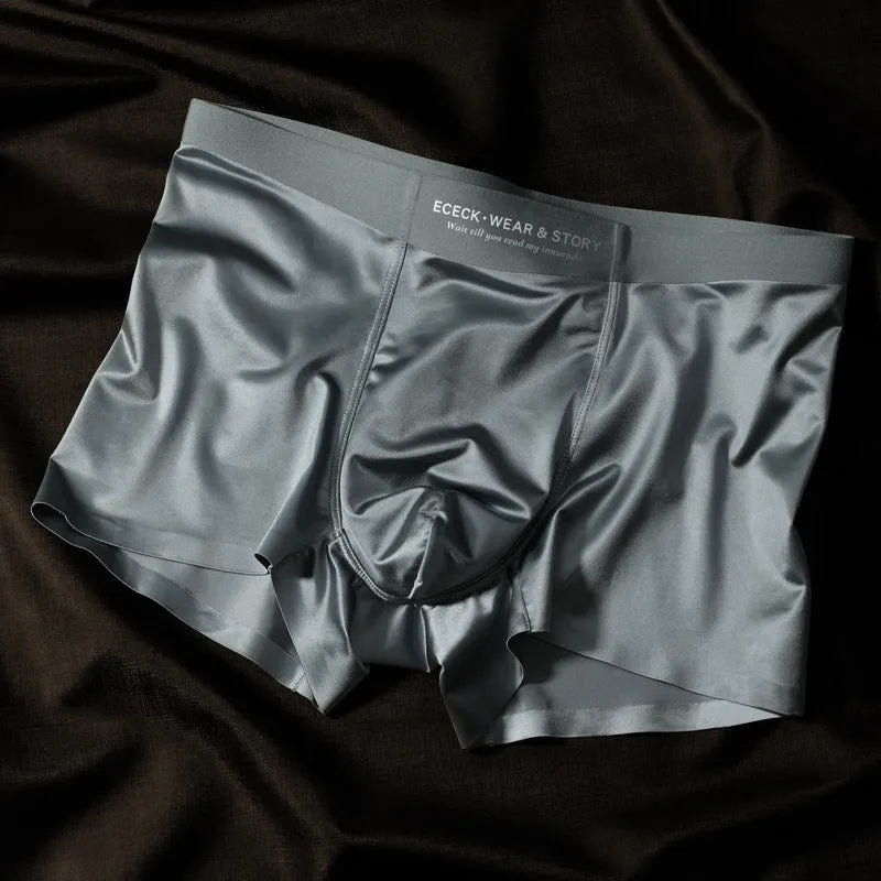 Men's colourblock Ice Silk seamless underwear in blue, brown, gray, and white colours.