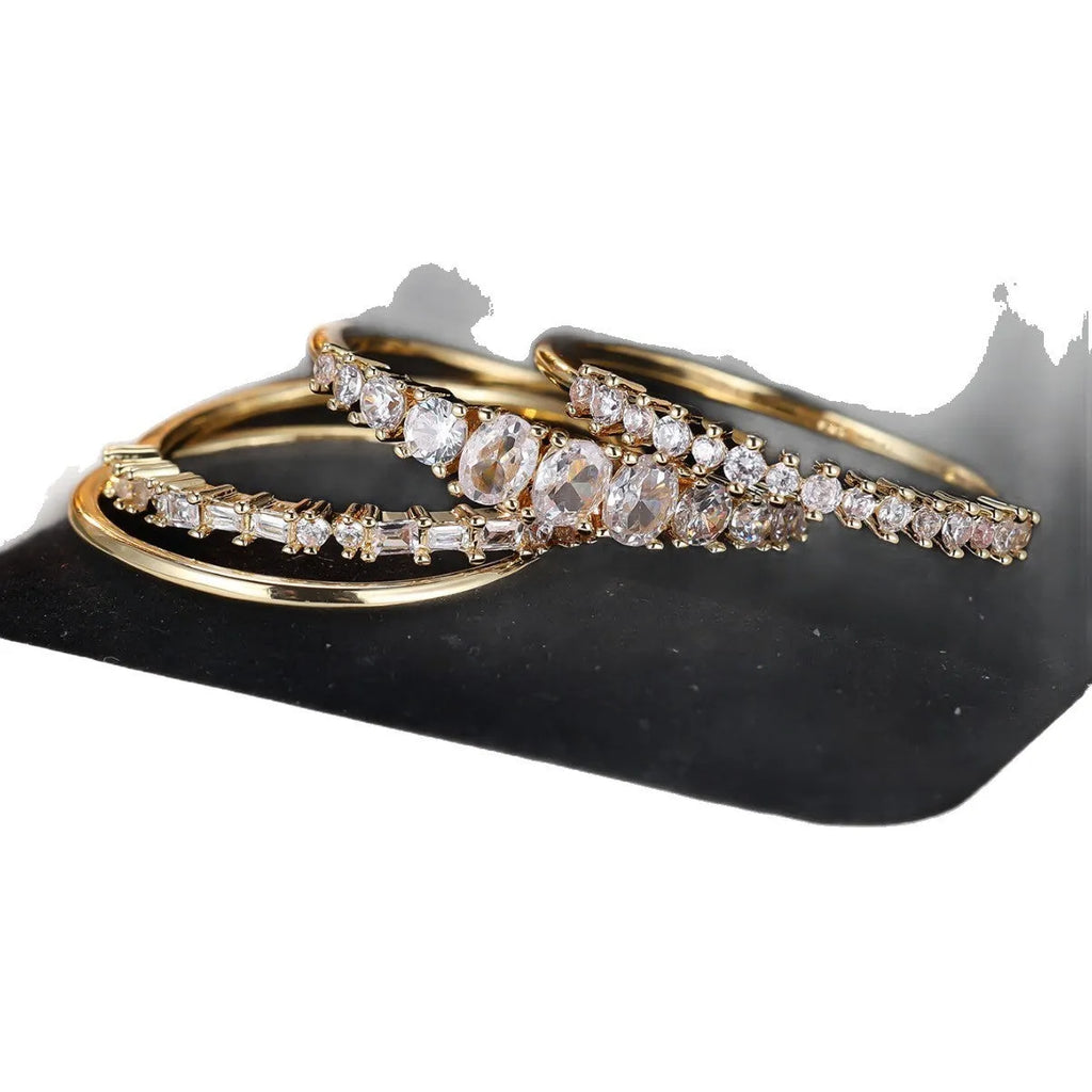 Round copper ring set with cubic zirconium electroplated finish in gold white diamond colour unisex style