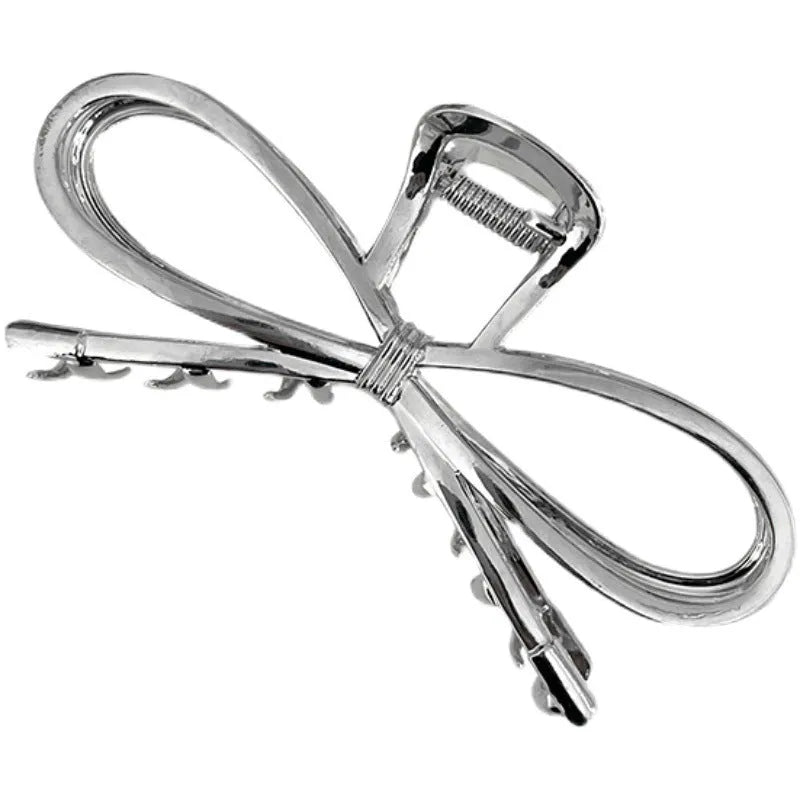 Korean style bow barrettes for women in gold and silver alloy metal with secure back head grip