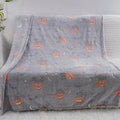 Colourful cartoon-pattern flannel blanket for children, shown in two size options.