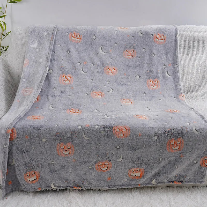 Colourful cartoon-pattern flannel blanket for children, shown in two size options.