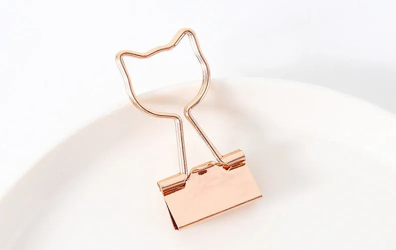 Gold plated metal office clip with decorative long tail design showing flamingo, love, clouds, cat, and cactus motif options