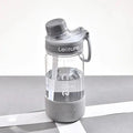 Cartoon pattern plastic straw cup in grey, green, or pink, showing heat-resistant and portable design.