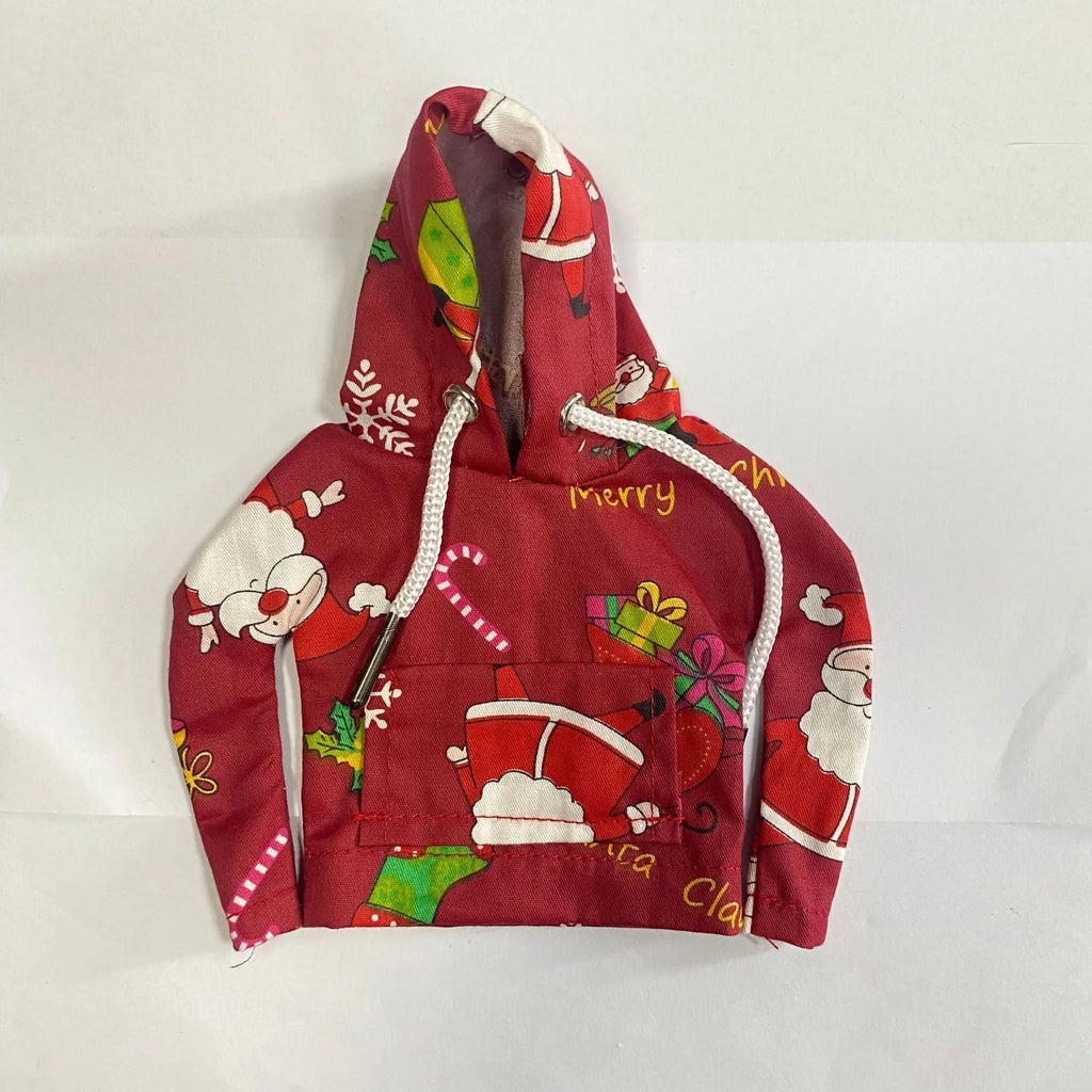 Multicolour cotton handbrake cover hooded over a car gear lever.