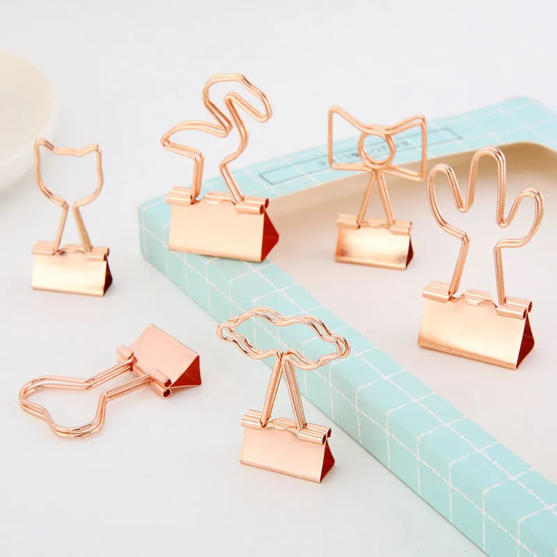 Gold plated metal office clip with decorative long tail design showing flamingo, love, clouds, cat, and cactus motif options