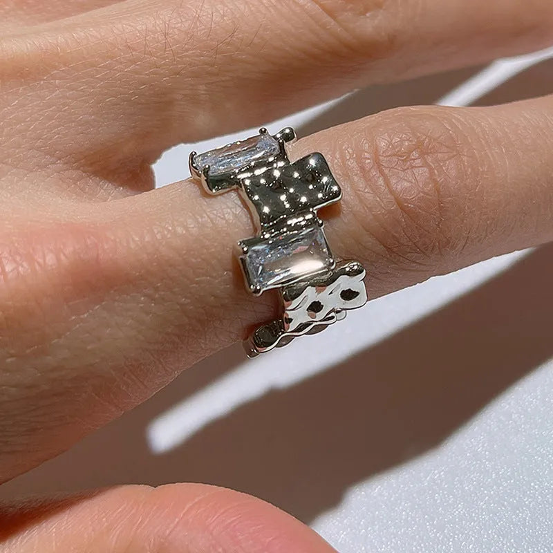 Geometric open gemstone ring in silver-plated metal with retro design