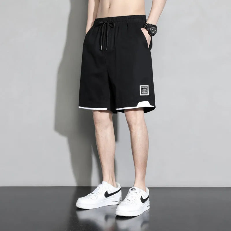 Boys cotton shorts in black, khaki, or white, shown in a loose-fitting Japanese style for summer.