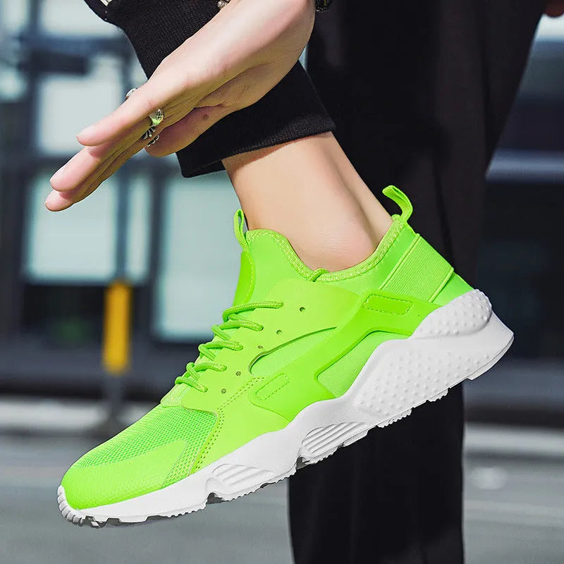 Men's low top casual shoes with mesh upper, cross straps and round toe in fluorescent colours