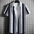 Man wearing a linen short sleeve t-shirt with a 3D printed colour simple striped pattern.