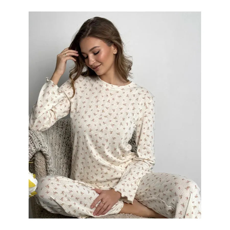 White floral print women's lounge suit with bell sleeve top and wide leg trousers