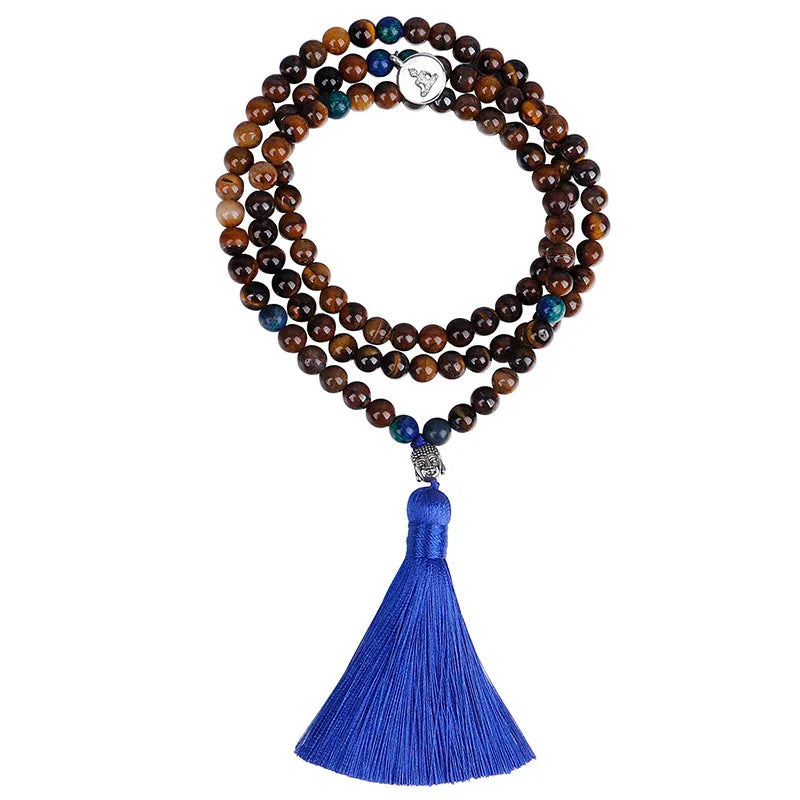 Handmade tiger eye stone bead necklace with tassel pendant and matching bracelet on a neutral background