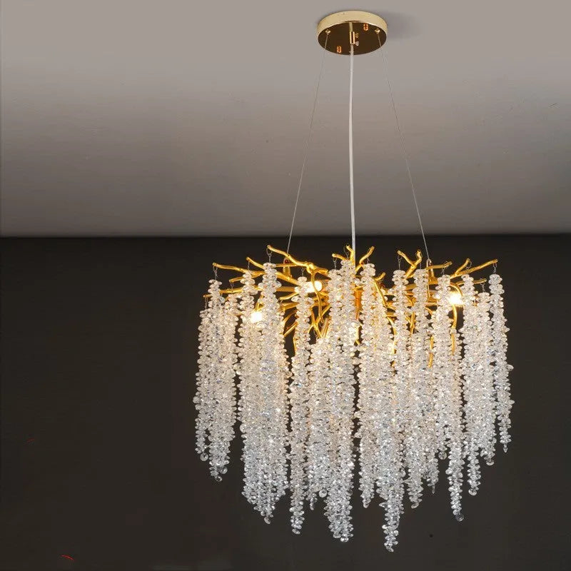 Modern crystal LED chandelier with adjustable height in a light luxury style.