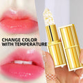 Three pieces of anti-smudge warm colour-changing lipstick in gold tubes, product code YB1001.