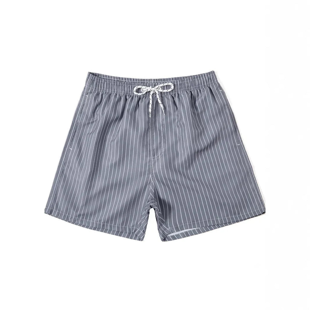 Men's striped polyester beach shorts in light blue with straight leg cut