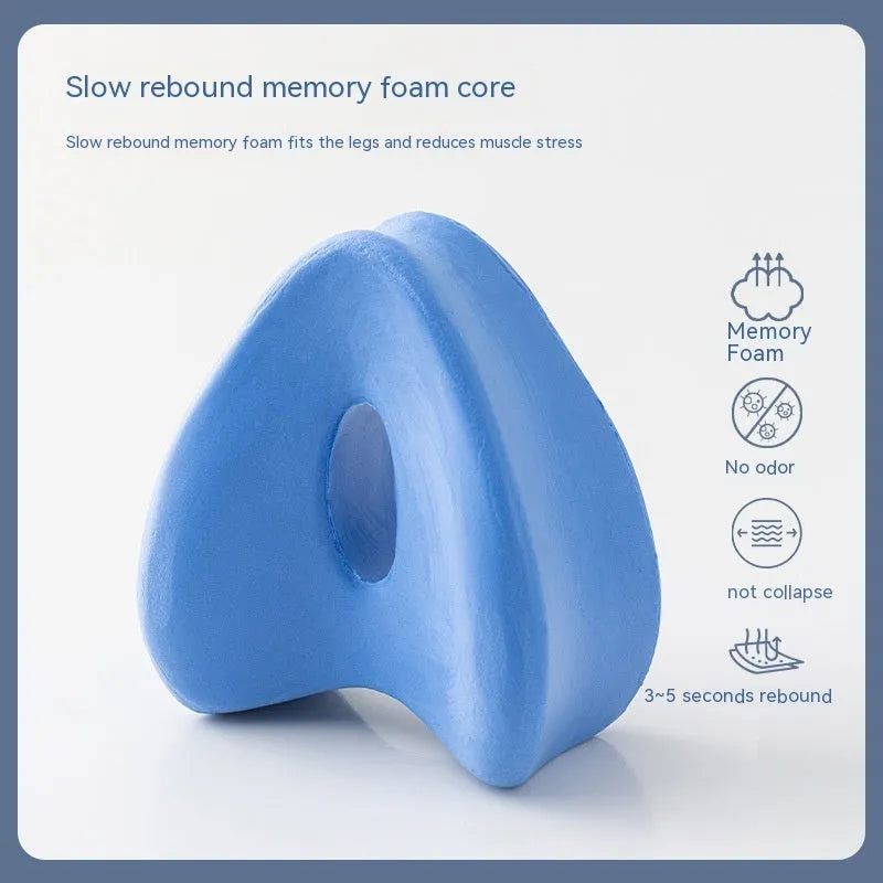 Heart-shaped memory foam leg pillow in blue colour with dimensions 25x23x13cm