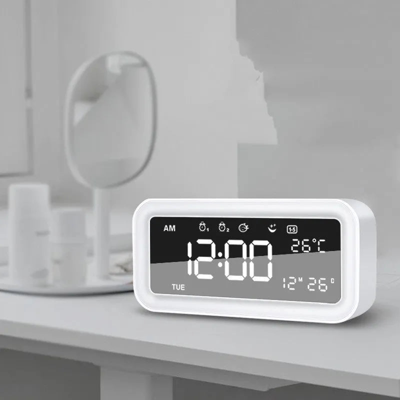 Rectangular digital alarm clock with LED atmospheric lighting and music function in blue colour option