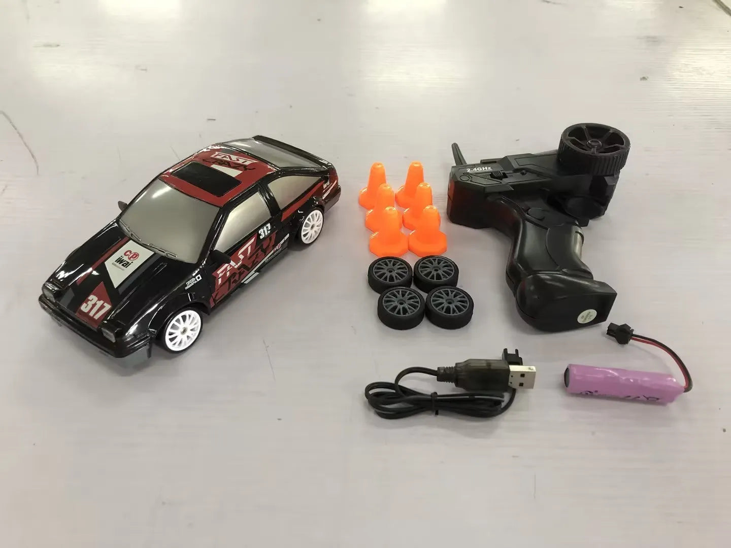 2.4G RC drift car 4WD 1:24 scale remote control toy GTR model in classic style on road with traffic cones