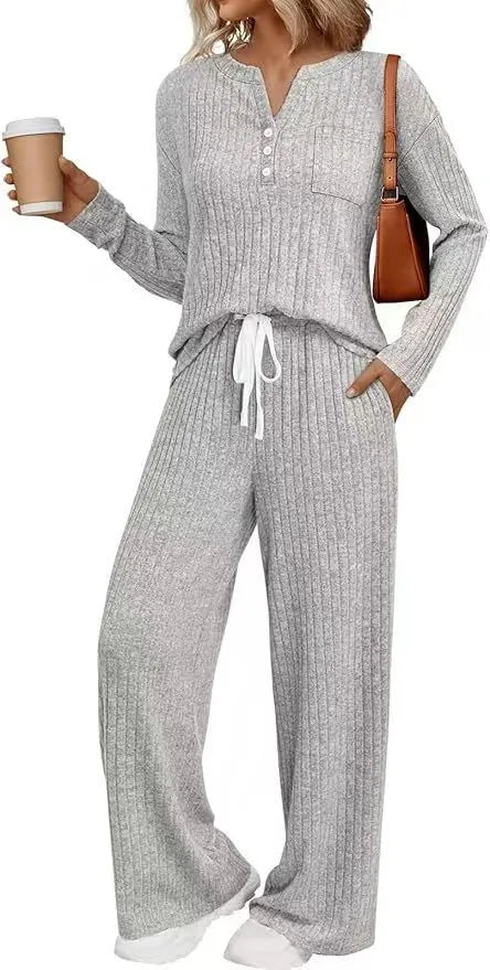 Knitted V-neck long coat with striped pattern in light grey colour showing lace-up details