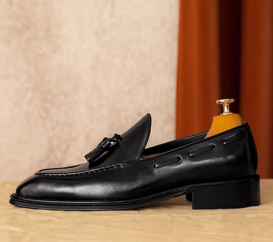 Men's black genuine leather loafers with fringed British styling and slip-on design