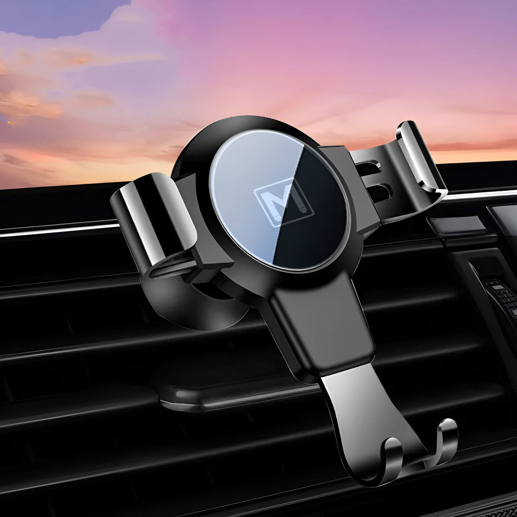 Black S4 gravity mirror ABS car phone holder attached to a vehicle's air conditioning vent.