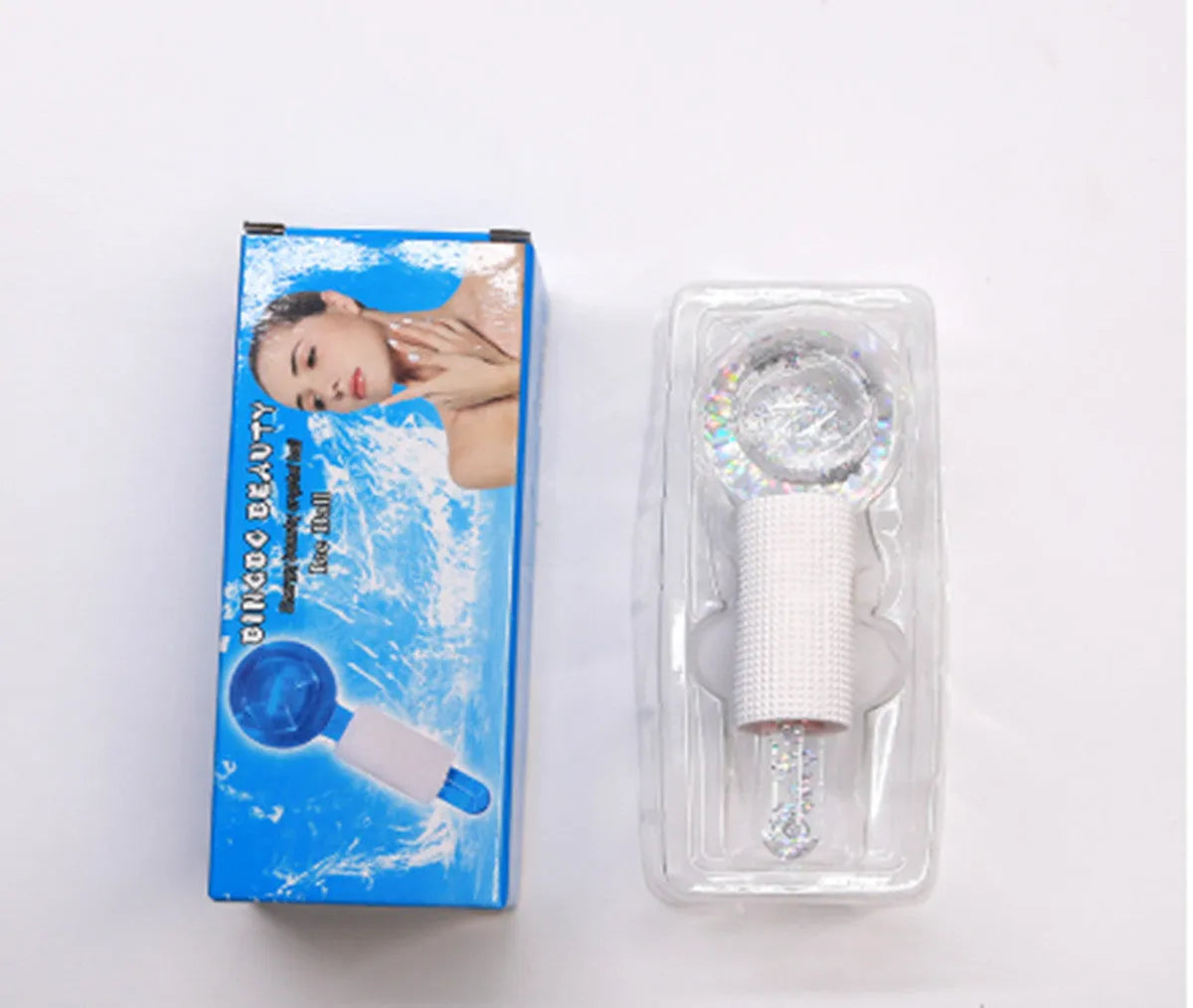 Set of two beauty ice wave ball face massage tools in purple flash finish on white background