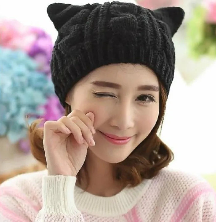 Hand made knitted cat ear beanie in winter colours with 3D design