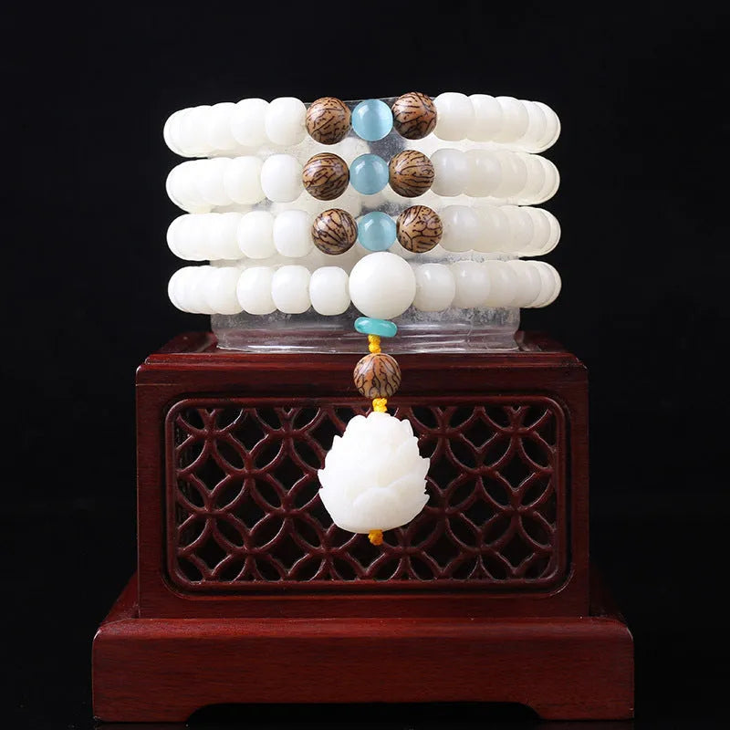 White jade Bodhi bead bracelet with 6x8mm beads in multiple design styles