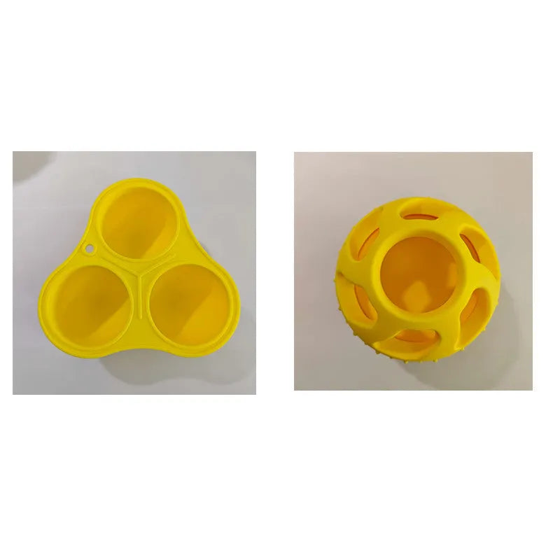 Yellow silicone dog toy ball with snack mould for slow feeding and dental care